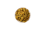 dried white mulberry fruit - latin Morus alba - in melamine bowl, isolated on white background. Spices and food ingredients.