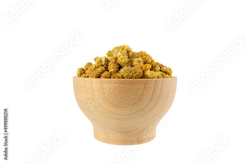dried white mulberry fruit - latin Morus alba -  in wooden bowl isolated on white background. Spices and food ingredients.