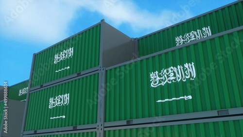 Saudi Arabia flag containers are located at the container terminal. Saudi Arabia export or import concept. 3d rendering