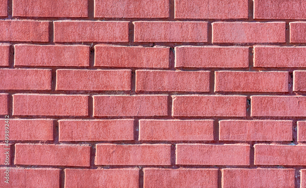 Obraz premium Old weathered red brick wall as background
