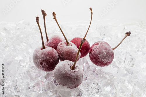 Fresh cherry berries on quick freeze ice