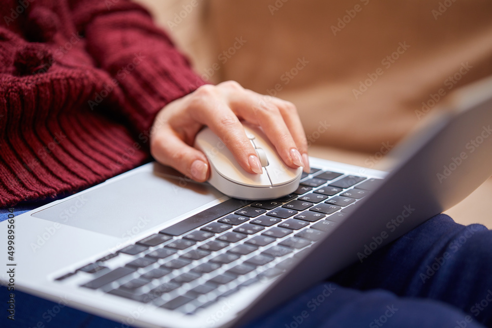 Beautiful woman relaxing at home with notebook Beautiful woman relaxing at home with notebook
