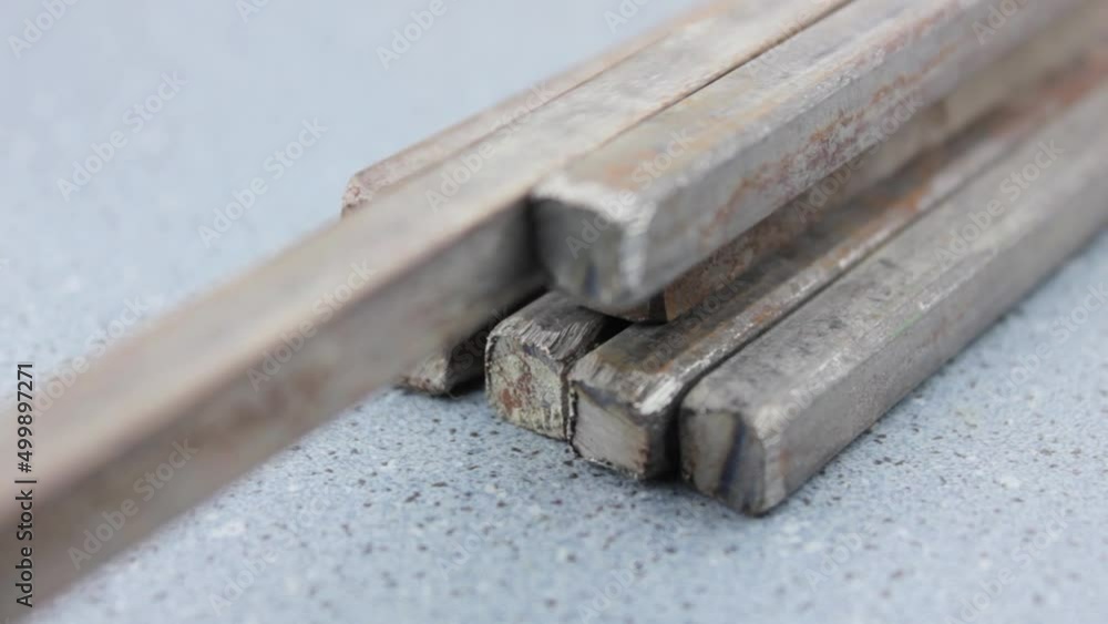 Metal fittings close-up. Metal rods. Metal iron bars. Metal fittings close-up. Metal rods. Metal iron bars.