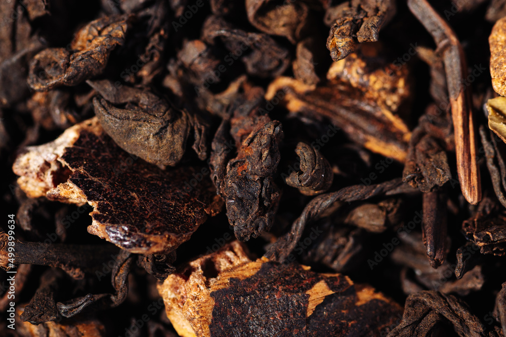 Chocolate black leaf shu pu-erh tea with cocoa beans close-up macro photography Chocolate black leaf shu pu-erh tea with cocoa beans close-up macro photography