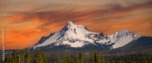Mt Theilsen under a sunrise sky covered with snow, near Diamond Lake and the summit of the Cascade mountains, Oregon, USA photo