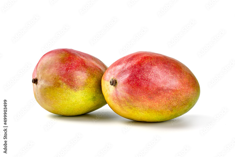 Juicy ripe Mango fruit, close-up, isolated on white background. Juicy ripe Mango fruit, close-up, isolated on white background.