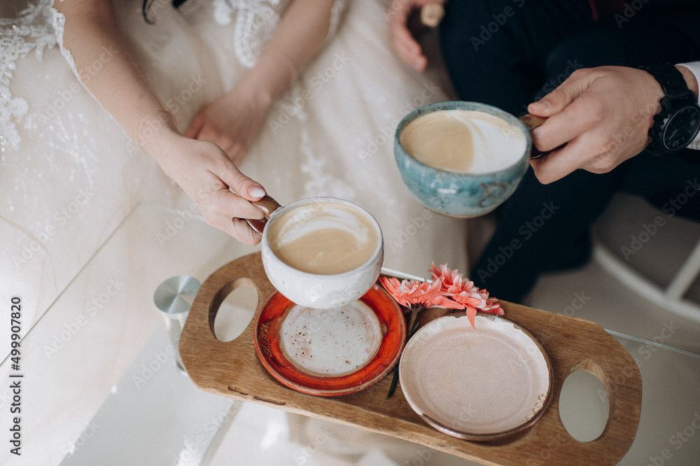 couple in love with coffee and tea for breakfast couple in love with coffee and tea for breakfast