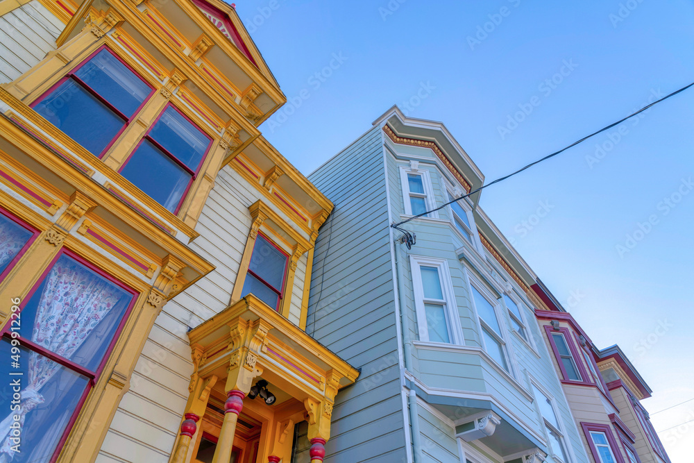 Three townhouses exterior in a low angle view at San Francisco, California