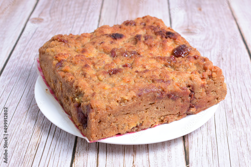 Fluffy bread cake with guava flavor on wooden background Fluffy bread cake with guava flavor on wooden background