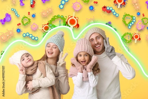 Healthy family with strong immunity on yellow background. Protection against germs, bacteria and viruses