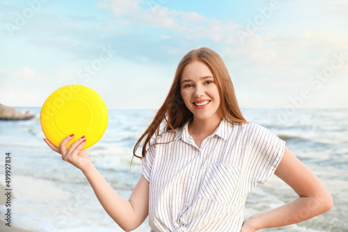 Happy young woman with fris...