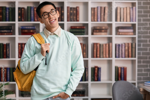 Male Asian student with bac...