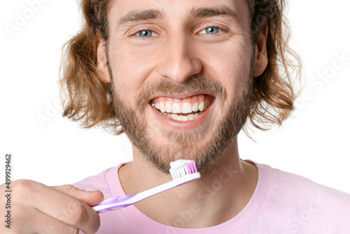 Young man and tooth brush w...