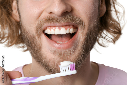Young man and tooth brush w...