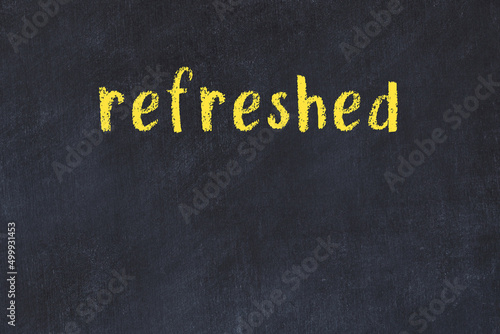 Obraz na plátně College chalk desk with the word refreshed written on in