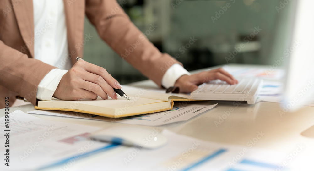 Bookkeeper or financial inspector hands making report, calculating. Home finances, investment, economy, saving money or insurance concept Bookkeeper or financial inspector hands making report, calculating. Home finances, investment, economy, saving money or insurance concept