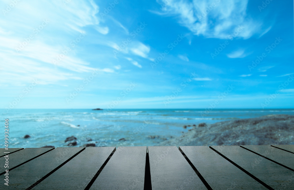 Table background of free space  for standing product against the background of the autumn sea landscape Blue sky and clouds.Space concept for text and decoration, advertisement.