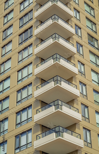 Facade detail of a modern high-rise apartment building.