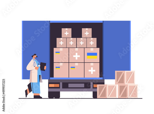 doctor near help boxes with medical supplies to refugees humanitarian aid material assistance governmental help