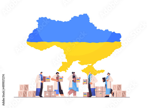 doctors holding help boxes with medical supplies humanitarian aid material assistance governmental help