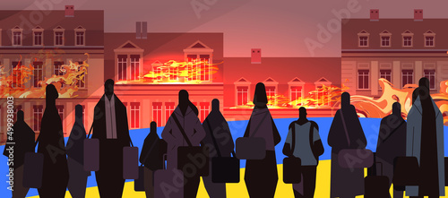 Ukrainian refugees with things fleeing russian aggression against Ukraine stop war concept people searching new homes