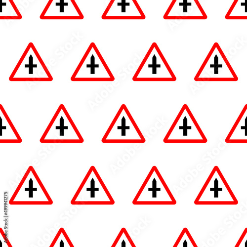 Vector red triangle traffic attention sign seamless pattern. Warning crossroads ahead traffic symbol