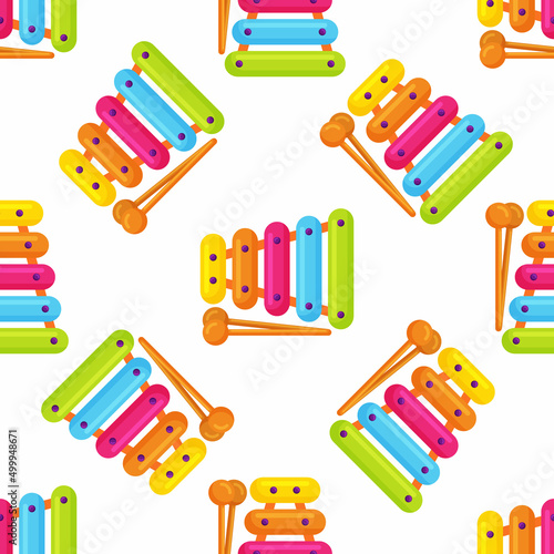 Kids toy xylophone seamless pattern, multicolored percussion musical instrument on background photo