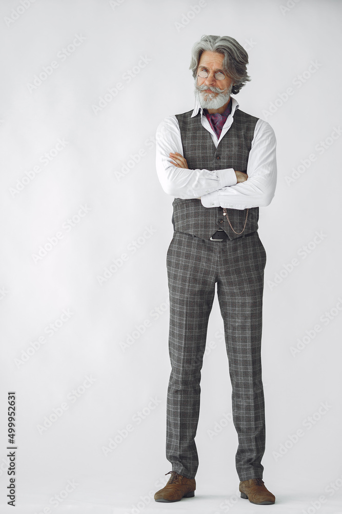 Handsome pensive mature businessman in formal suit