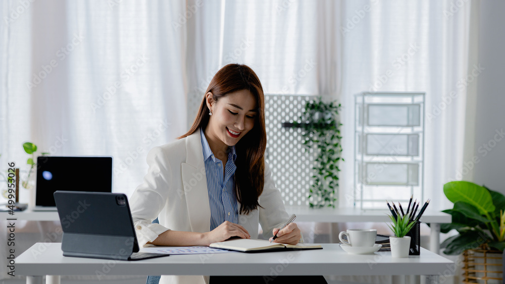 Asian women working in the office, young Asian business women as business executives, founding and running start-up executives, young female business leaders. Startup business concept. Asian women working in the office, young Asian business women as business executives, founding and running start-up executives, young female business leaders. Startup business concept.