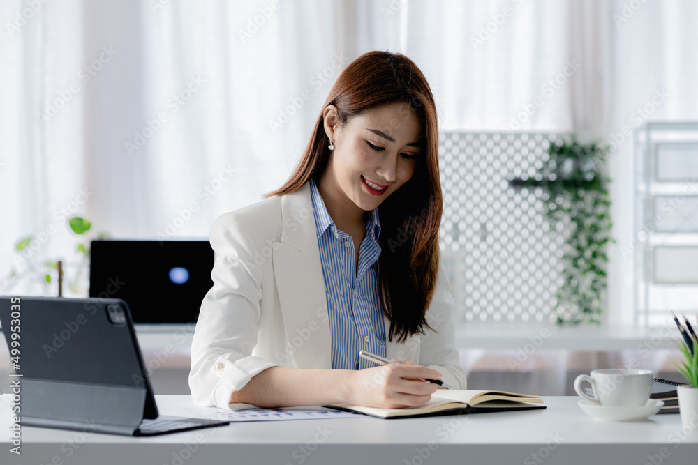 Asian women working in the office, young Asian business women as business executives, founding and running start-up executives, young female business leaders. Startup business concept. Asian women working in the office, young Asian business women as business executives, founding and running start-up executives, young female business leaders. Startup business concept.