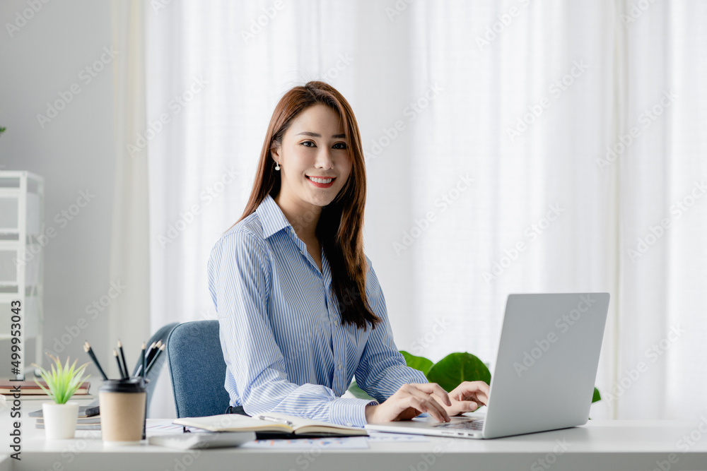 Asian women working in the office, young Asian business women as business executives, founding and running start-up executives, young female business leaders. Startup business concept. Asian women working in the office, young Asian business women as business executives, founding and running start-up executives, young female business leaders. Startup business concept.