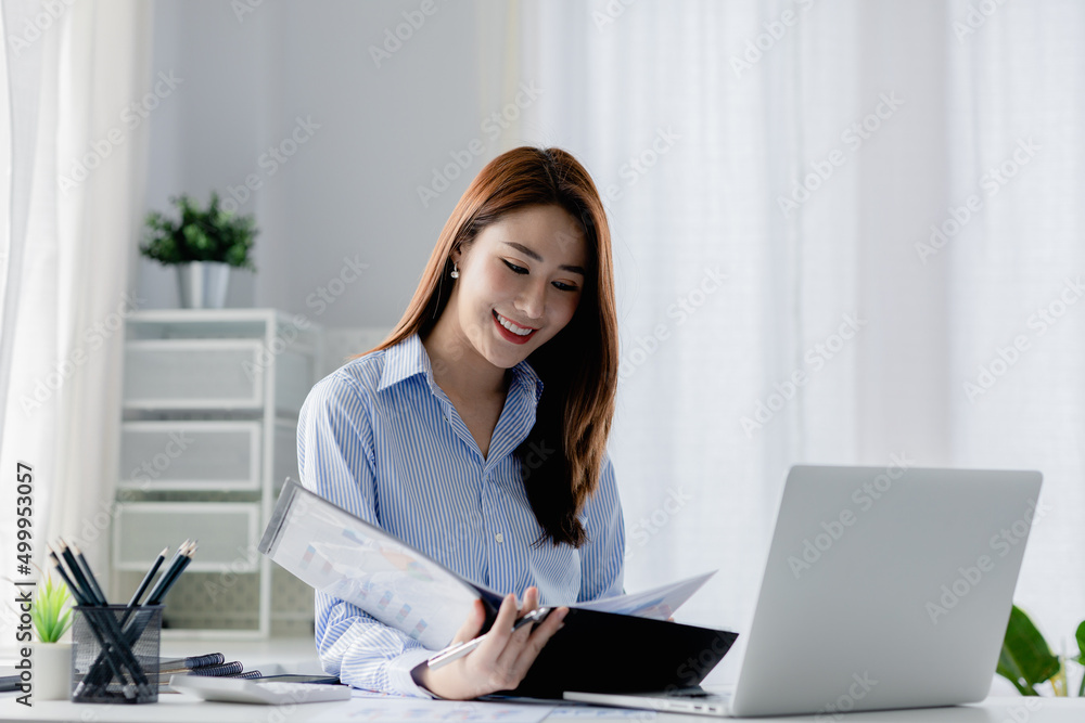Asian women working in the office, young Asian business women as business executives, founding and running start-up executives, young female business leaders. Startup business concept. Asian women working in the office, young Asian business women as business executives, founding and running start-up executives, young female business leaders. Startup business concept.