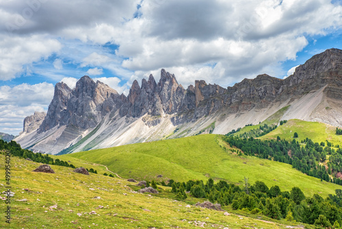 Awesome view at a mountain range with peaks in the dolomites