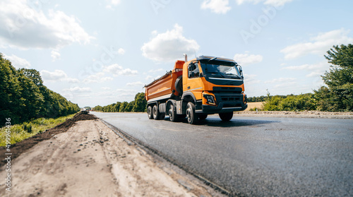 Canvas Print Dumper truck ready to unload soil or groud at construction site