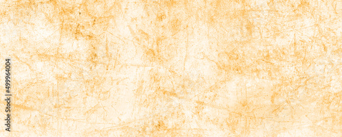 Old brown paper texture, vintage paper background, Plaster on a yellow wall. Concrete wall texture close up, Old distressed illustration. Abstract damaged illustration.