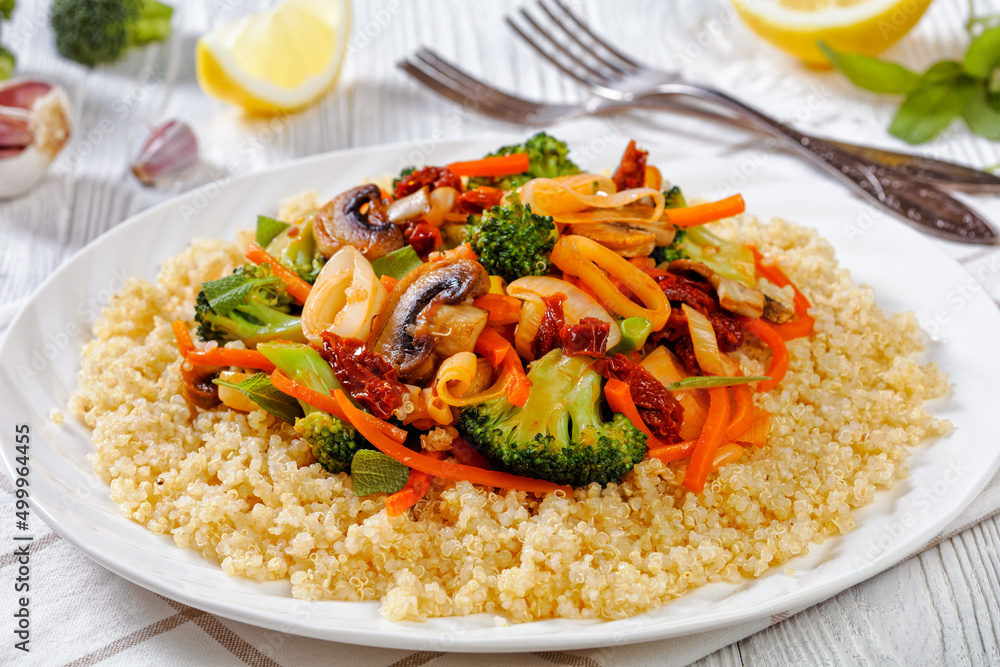 quinoa with fried veggies, mushrooms on plate