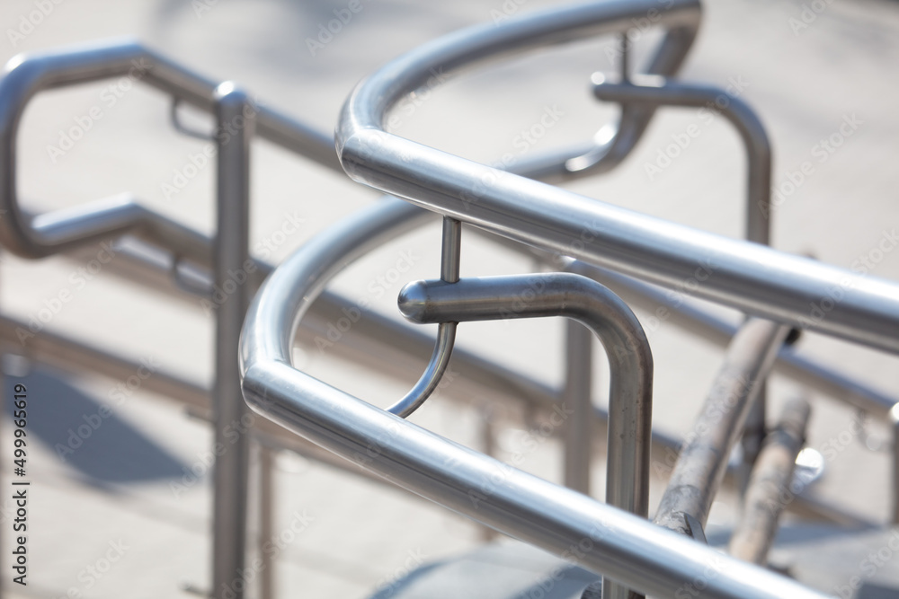 Metal railing on the stairs as a background Metal railing on the stairs as a background