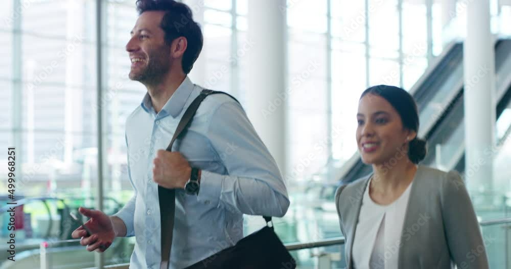 You ready for this. Two businesspeople walking through their office building. You ready for this. Two businesspeople walking through their office building.