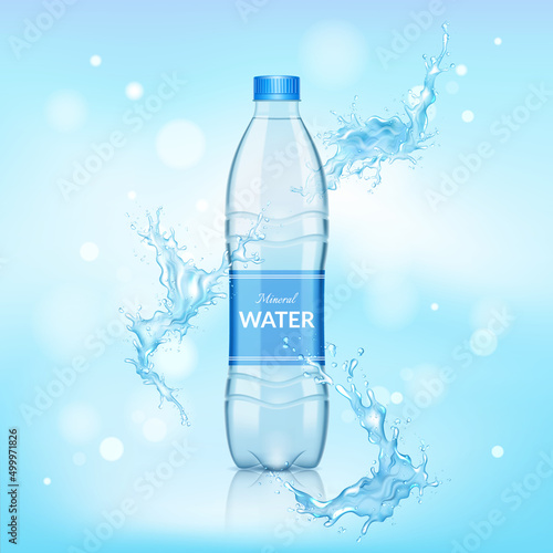 Transparent plastic bottle of pure mineral water with splash on a blue background.