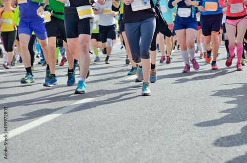Cuadro en lienzo Marathon running race, many runners feet on road racing, sport competition, fitn