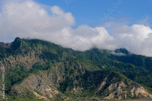 The rugged mountains covered in clouds on tropical Atauro Island in Dili, East Timor, on the extinct Wetar segment of the volcanic Inner Banda Arc