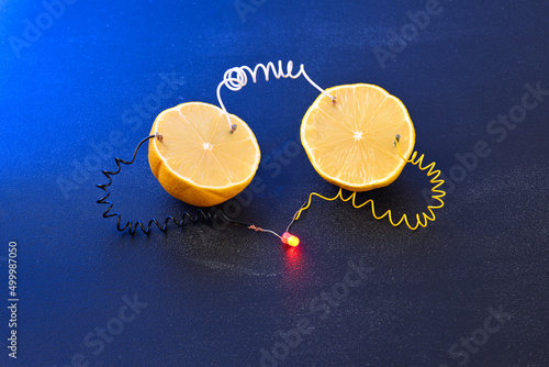 Free energy electricity generator using Lemon in blue light.