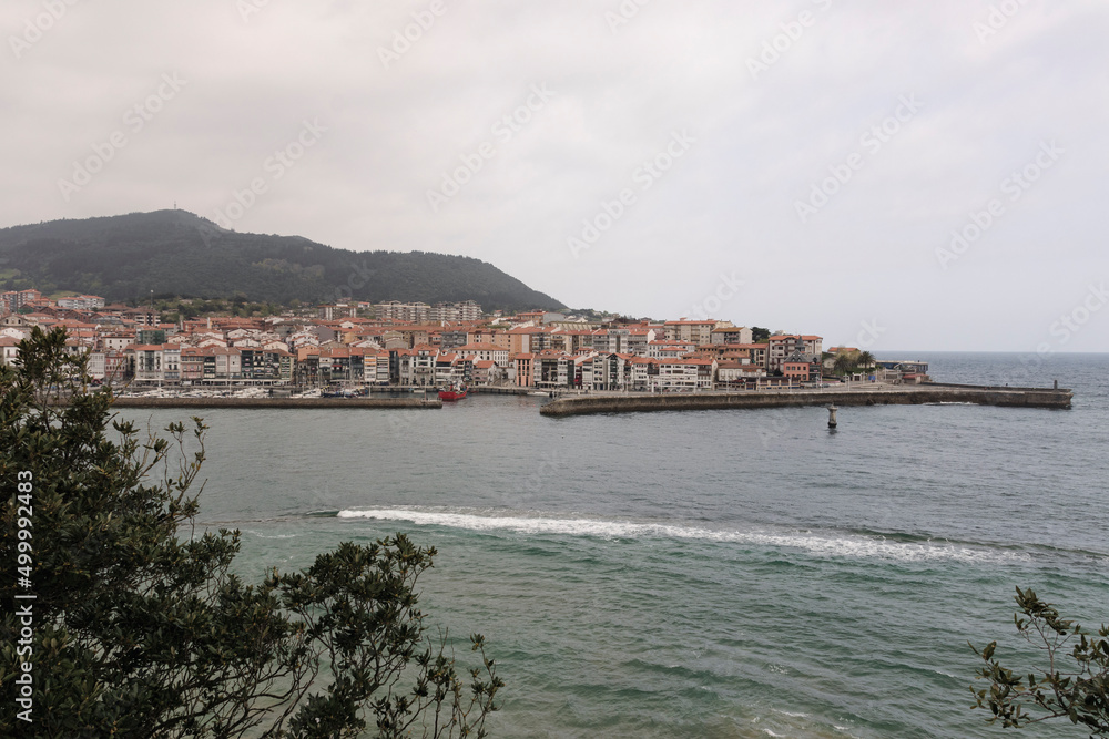 panoramic view of the town of lekeitio a cloudy day