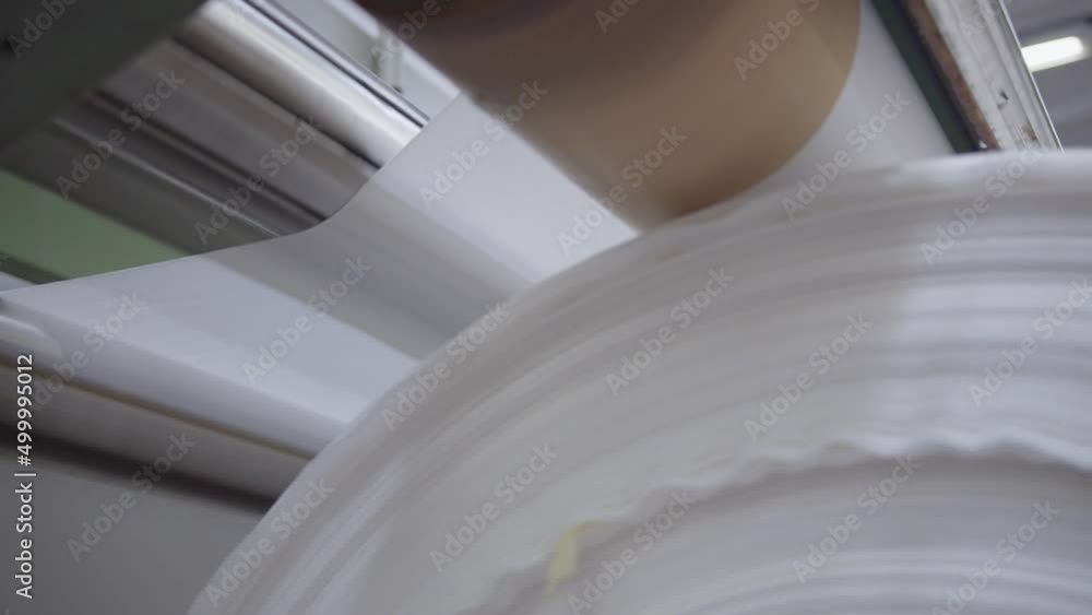 Close up of a fabric machine, Fabric making machine in Portugal, cloth production, towel production Close up of a fabric machine, Fabric making machine in Portugal, cloth production, towel production