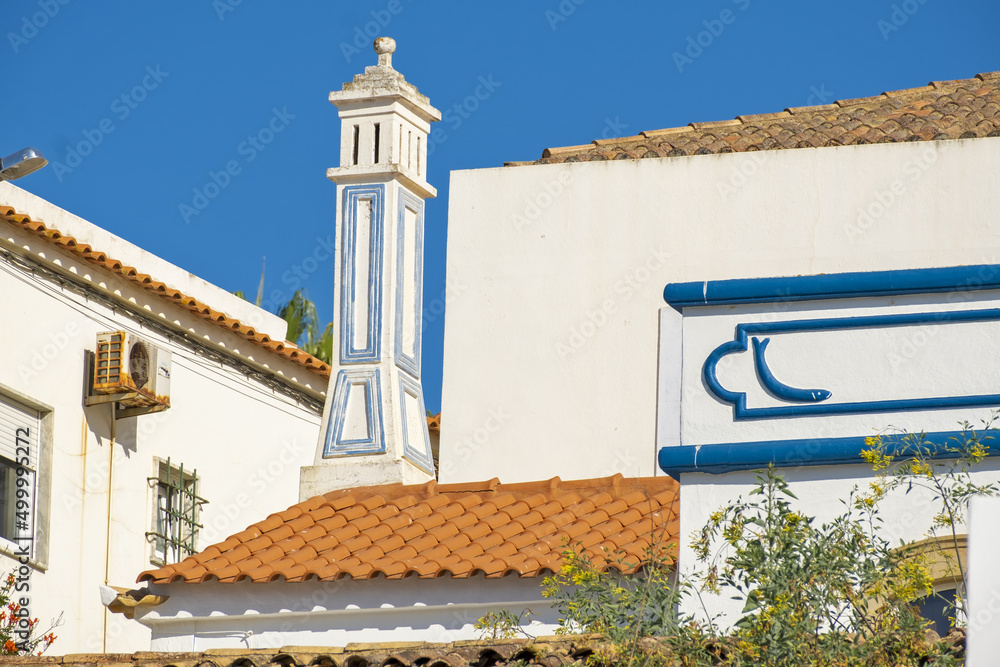 Εκτύπωση καμβά traditional openwork chimney on a roof in Carvoeiro, Algarve, Portugal