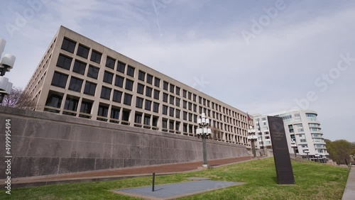 The United States Department of Labor Frances Perkins Building in Washington, D.C  seen from Constitution Avenue in a wide shot. This federal executive department administers employment laws. photo