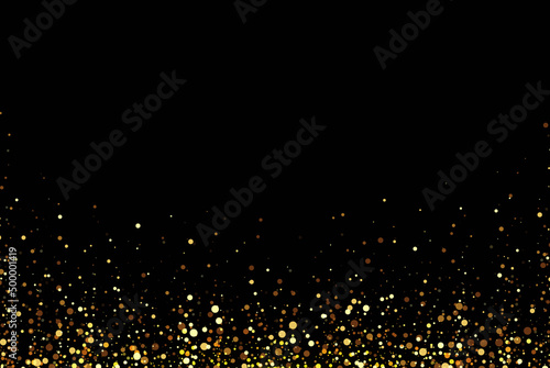 Gold glitter background with shiny light confetti on black background. Golden shimmery texture for luxury background design.
