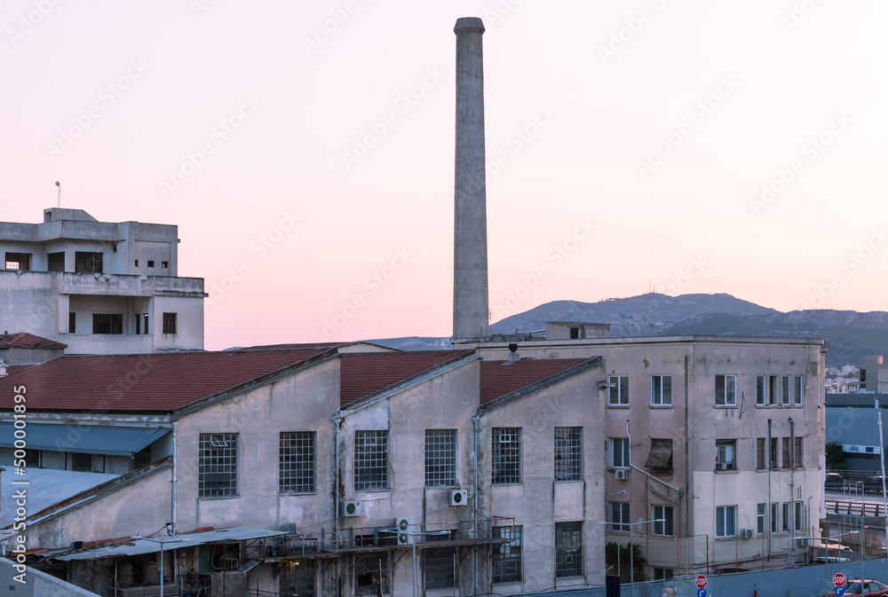 industrial enterprise appearance and factory chimney, Athens