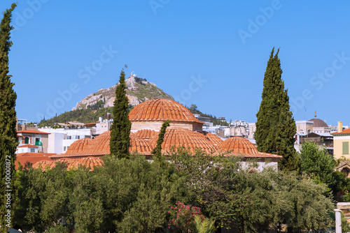 Domes of orthodox cathedral under Acropolis of Athens, Greece © Polina