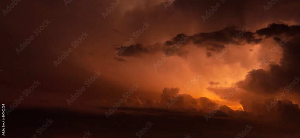 Fork lightning striking down during summer storm